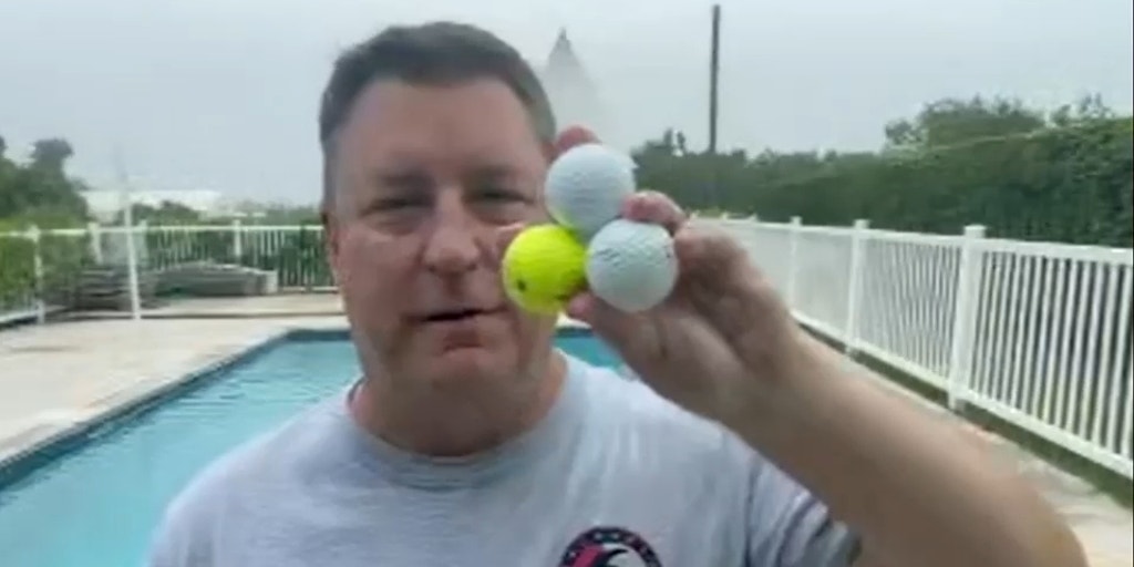 Golf balls fall from trees as powerful winds from Hurricane Ernesto blow through Bermuda