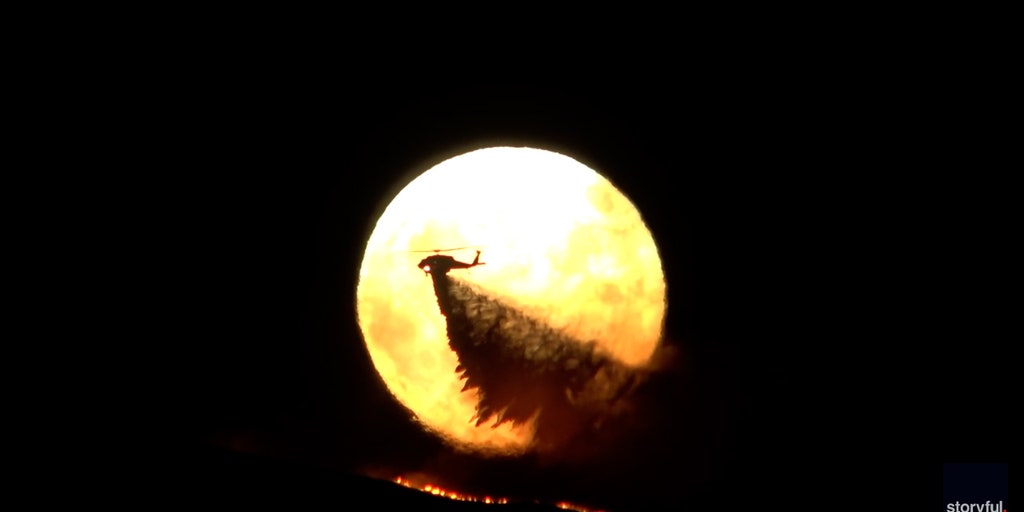 VIDEO: Supermoon rises in California as planes battle raging wildfire