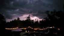 Powerful thunderstorms in Northeast produce vivid lightning, damaging wind gusts