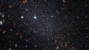 Hubble telescope spots a 'lonely light in the dark' in distant dwarf galaxy