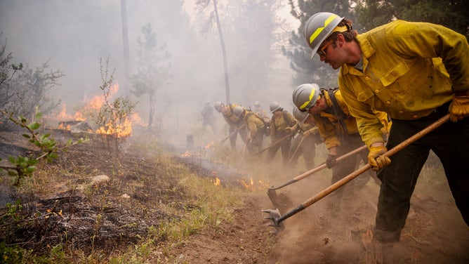 Firefighters work the Alexander Mountain Fire