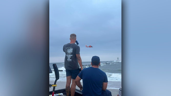 Two men were also rescued from a jetty along the Jersey Shore as dangerous rip currents impacted the area, the Barnegat Light Volunteer Fire Company No. 1 said on Facebook.