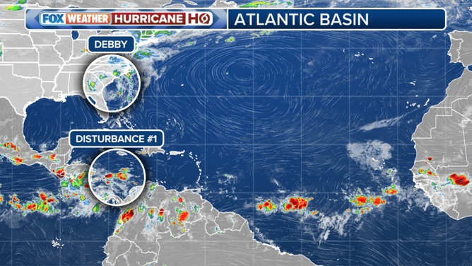 A tropical disturbance moving through the Caribbean will move into a slightly more conducive atmospheric regime when it gets to the southern Gulf of Mexico.