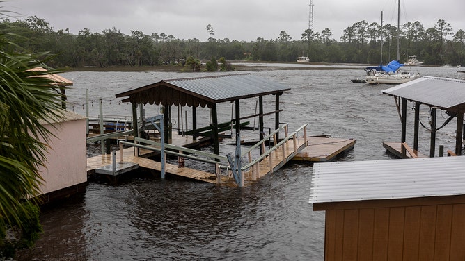 Boating docks float in the storm surge as Hurricane Debby makes landfall in Steinhatchee, Florida, US, on Monday, Aug. 5, 2024.