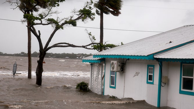 High winds, rain and storm surge from Hurricane Debby inundate a neighborhood on August 05, 2024, in Cedar Key, Florida.