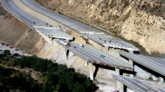 An archive photo taken on January 17, 1994, shows a collapsed section of freeways in the Los Angeles after an earthquake, measuring 6.6 on the Richter scale, hit the Southern California area.