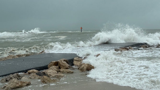 Waves were crashing ashore Sunday afternoon in North Jetty Park, Florida, as Hurricane Debby approached the Big Bend shorelines.