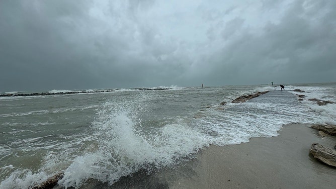 Waves were crashing ashore Sunday afternoon in North Jetty Park, Florida, as Hurricane Debby approached the Big Bend shorelines.