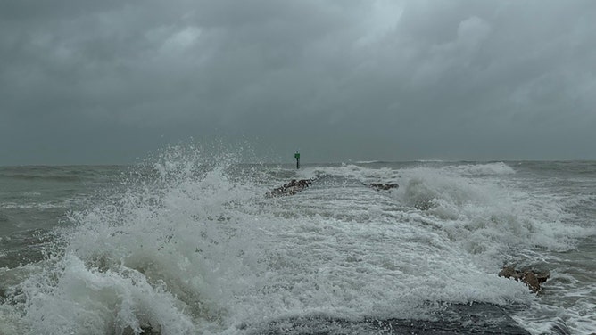 Waves were crashing ashore Sunday afternoon in North Jetty Park, Florida, as Hurricane Debby approached the Big Bend shorelines.