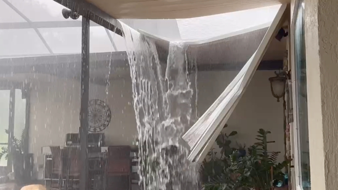 Pool cover collapses.