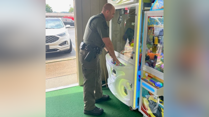 State Game Warden Salvadore Zaffuto responded to the report of the groundhog.