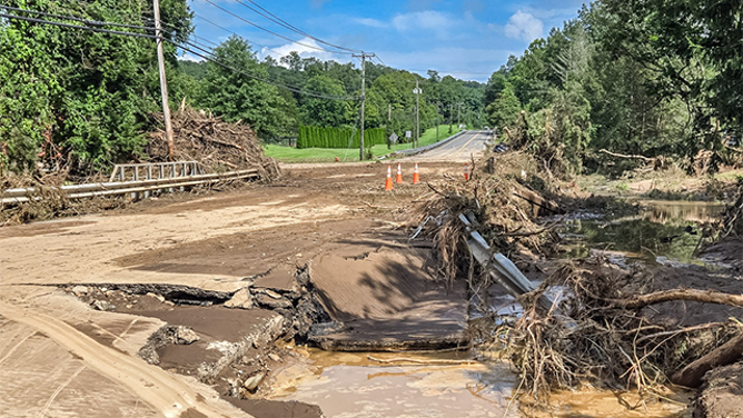 This photo shows the damage and destruction on Route 67 in Southbury, Connecticut, on Monday following catastrophic and deadly flooding over the weekend.