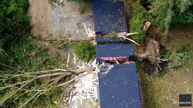 A Michigan home was torn to shreds by falling trees when a line of severe storms hit the region on Wednesday.