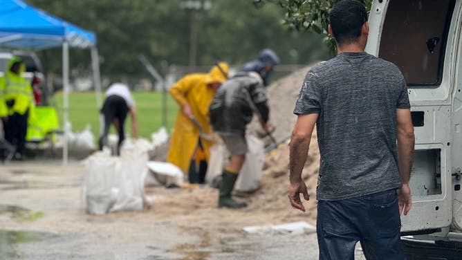 Residents pack sandbags in Charleston, South Carolina on Monday, August 5, 2024 in preparation for Tropical Storm Debby's winds and rain.