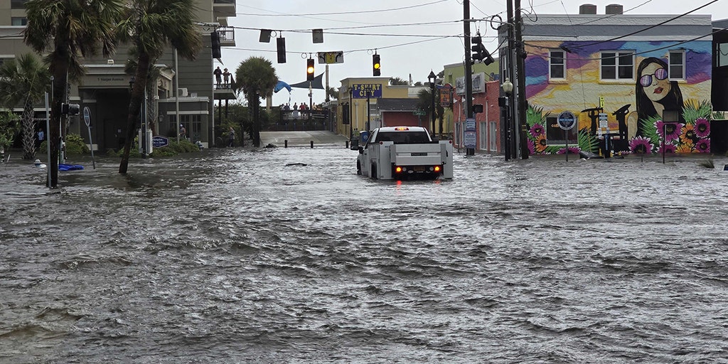 Flooding rain, gusty winds batter North Carolina as Potential Tropical Cyclone 8 approaches coast