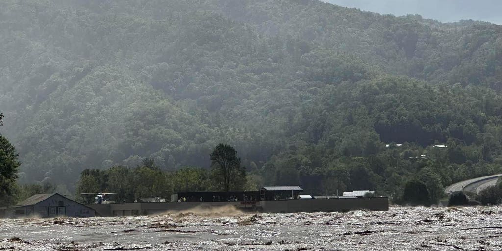 Dozens of people are trapped on the roof of a flooded Tennessee hospital during the Helene rains