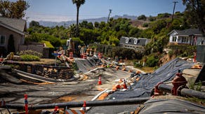 Ongoing landslide near Los Angeles causes weeks-long power shutoffs as heat wave sizzles region