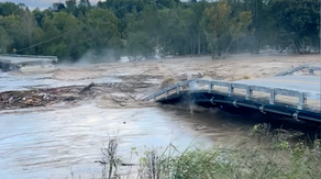 'Get out of the way!': Bridge collapses into river flooded by Helene in East Tennessee