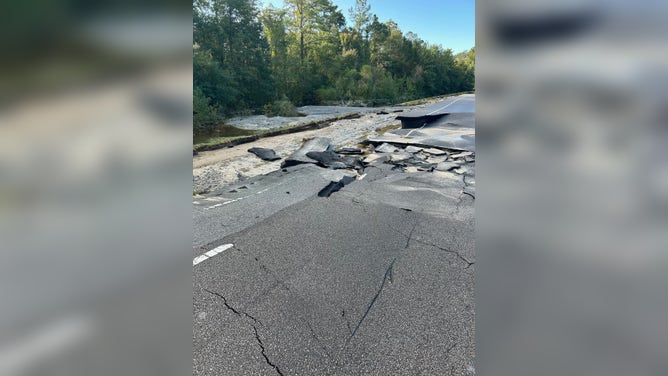 U.S. 17 flooded and collapsed south of Winnabow, NC.