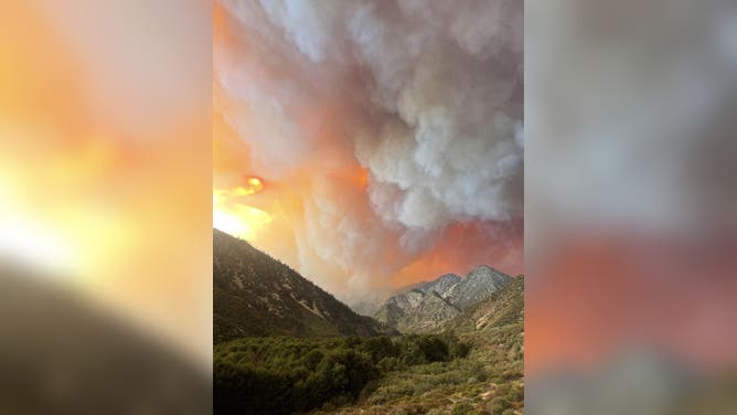 The Bridge Fire burns in the mountains in southern California.