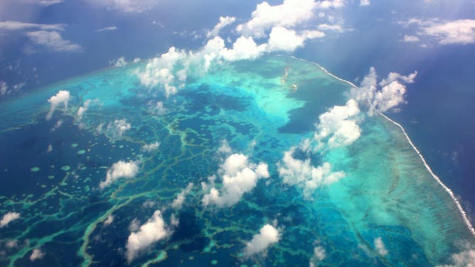 An aerial view of North Island, Pearl and Hermes Atoll, which shows the amazingly intricate coral matrix in the blue lagoon.