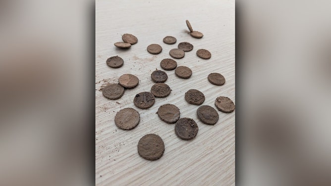 A handout image depicts 27 silver Roman coins, dating from 94 to 74 BC, found in a treasure trove on the remote island of Pantelleria, Sicily, Italy.