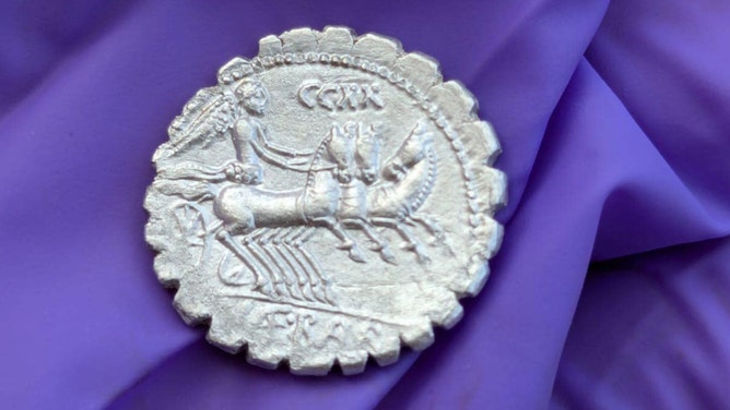 A handout image depicts one of the 27 silver Roman coins, dating from 94 to 74 BC, found in a treasure trove on the remote island of Pantelleria, Sicily, Italy.