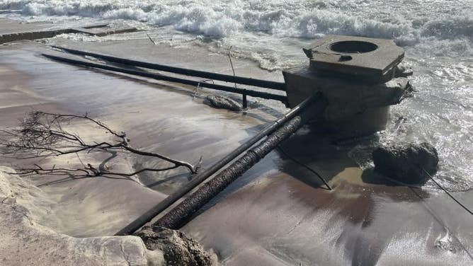 Newly exposed former military infrastructure on the beach.