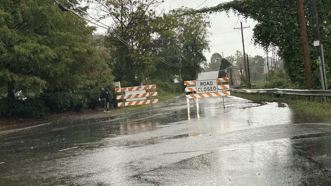 Flooding along Swananoa River road in Biltmore Village.