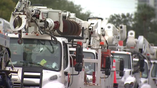 This photo shows utility workers in Florida preparing for Helene's construction.