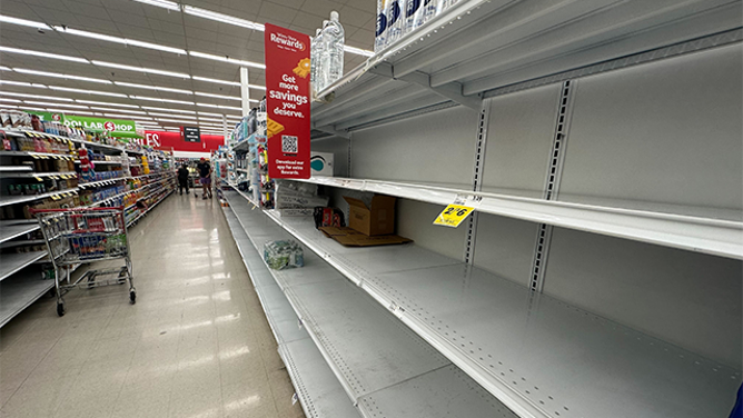 This photo shows empty shelves at a Winn-Dixie in St. Petersburg, Florida, in front of Helene.