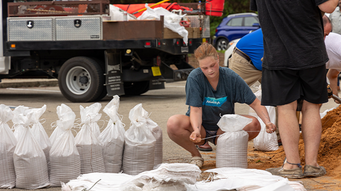 This image shows Florida residents filling sandbags in the coming days before Helene's likely arrival. Potential Tropical Cyclone Nine was designated in the Caribbean on Monday, September 23, 2024, and the system is expected to strengthen into a hurricane this week on its way to the U.S. Gulf Coast.