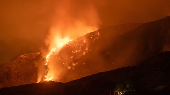A hillside burns during the Line Fire in Mountain Home Village, California, US, on Monday, Sept. 9, 2024.