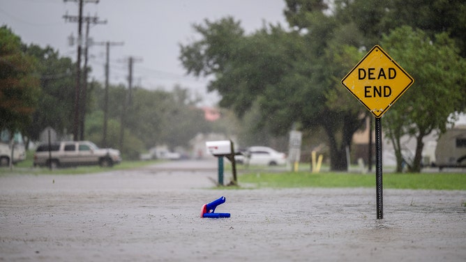 During Hurricane Francine on September 11, 2024, floodwaters inundate a residential neighborhood in Dulac, Louisiana.