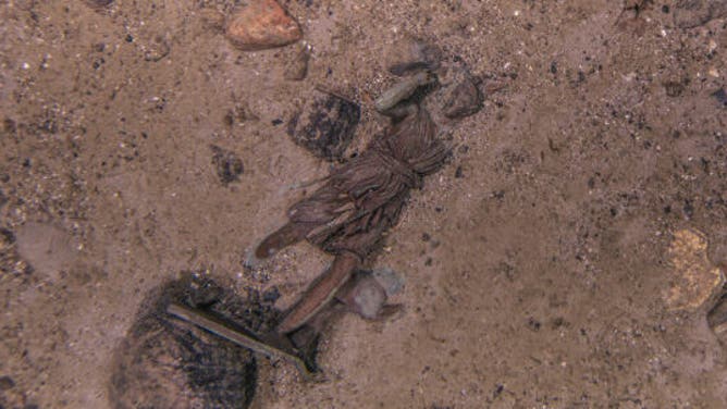 Diana on the ocean floor.