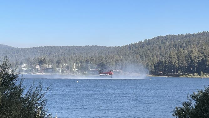 CAL FIRE aircraft picking up water to fight Line Fire