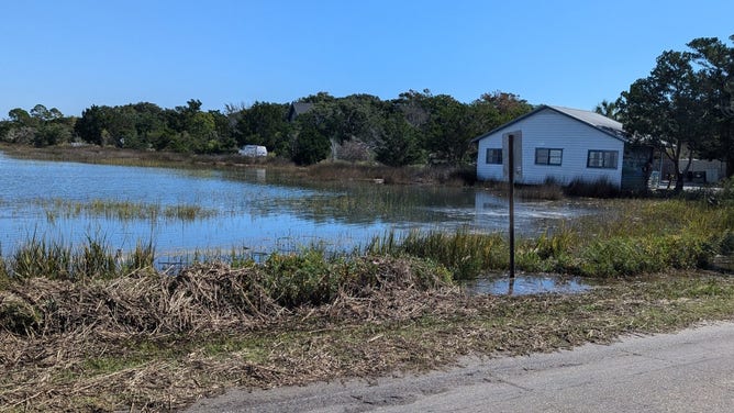 Sunny day flooding in Pawleys Island, South Carolina.