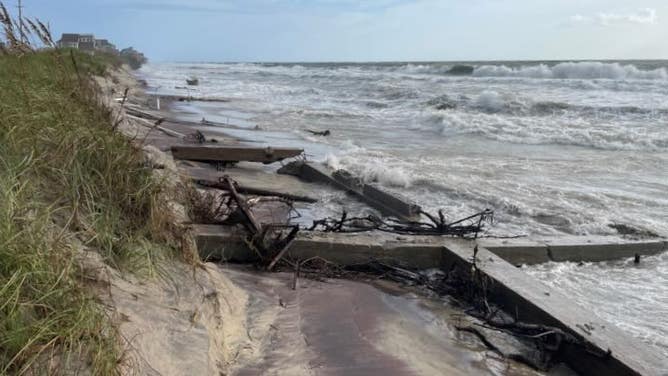 Newly exposed former military infrastructure on the beach.