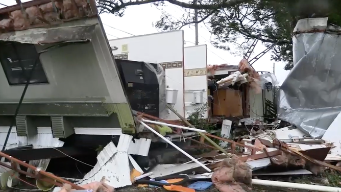 Mobile home ripped open.