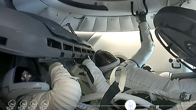 The view inside the Dragon capsule as the forward hatch is open during spacewalk operations on Sept. 12, 2024.