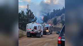 Evacuation orders lifted in fast-moving Colorado wildfire as firefighters gain containment