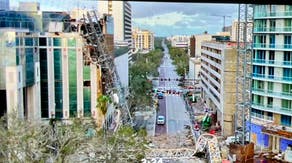 Construction crane crashes into St. Petersburg building during Hurricane Milton