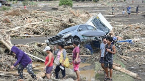 Death count climbs as Tropical Storm Trami strikes the Philippines