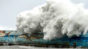 Typhoon Kong-rey blasts Taiwan with destructive winds, flooding rain leaving at least 1 dead