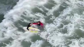 Watch: Surfers rescue of fisherman knocked off jetty during New Jersey surfing competition