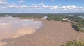 One-mile-long floating barrier installed in East Tennessee lake to catch Helene flood debris