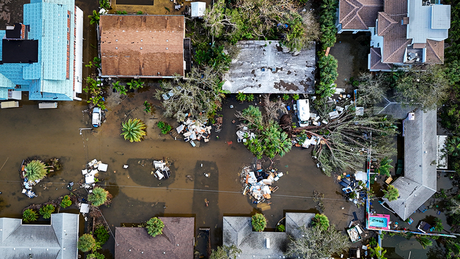 A drone image shows a street flooded by Hurricane Milton in Siesta Key, Florida, on October 10, 2024. At least four people were confirmed to have been killed in two tornadoes triggered by Hurricane Milton on the east coast of the U.S. state of Florida, local authorities said on Thursday.