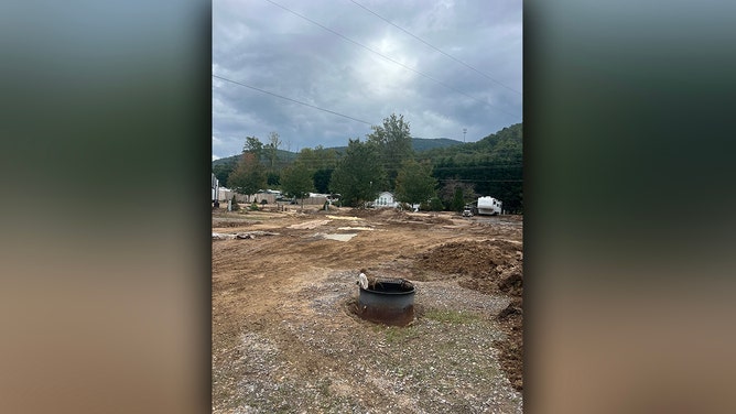 Sheryl Pfeiffer found herself fighting for her life when Hurricane Helene's floodwaters began to rise around her camper in western North Carolina. Stranded at a campground in Asheville, she and her dog, Carley, faced an uncertain future.