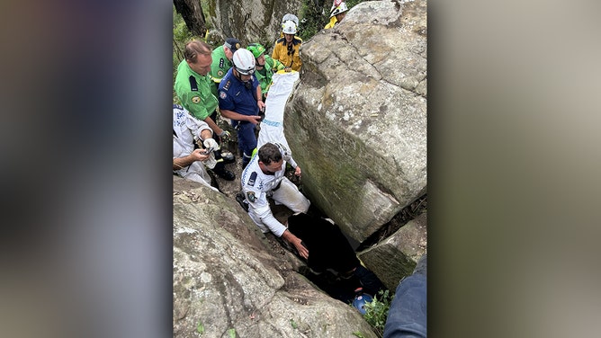 A woman was rescued after being wedged between two boulders in a nightmare seven-hour ordeal in Australia’s Hunter Valley, the New South Wales ambulance service said.