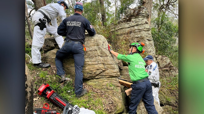 A woman was rescued after being wedged between two boulders in a nightmare seven-hour ordeal in Australia’s Hunter Valley, the New South Wales ambulance service said.